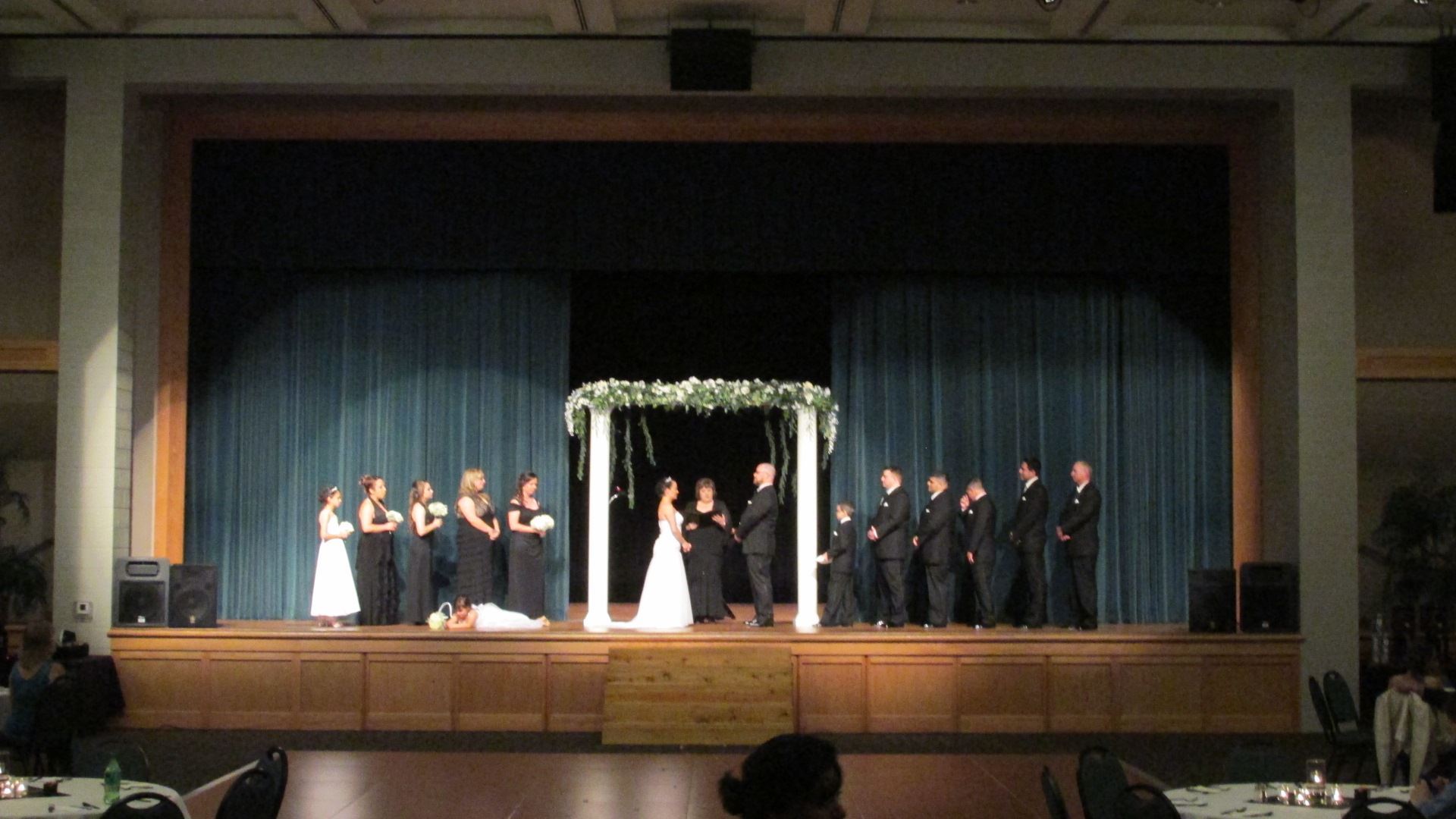 Wedding ceremony in the Great Hall with the wedding party on stage